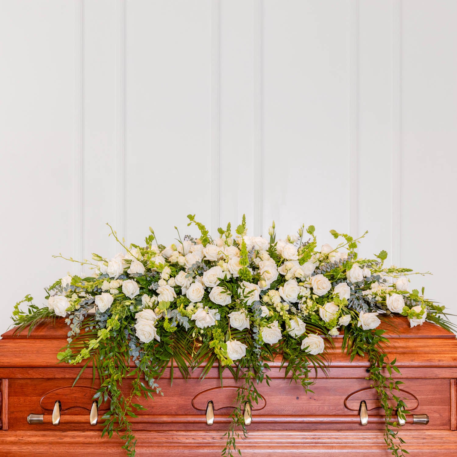 White Elegance Casket Spray